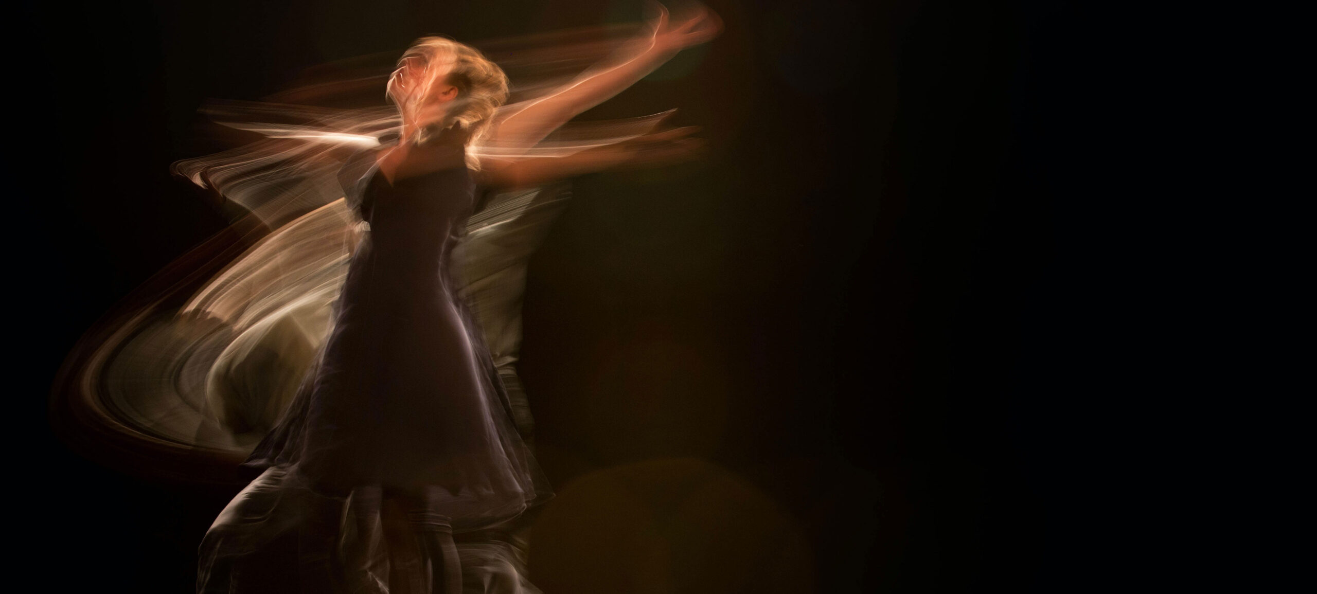 Person Doing Ballet with Black Background Person Doing Ballet with Black Background